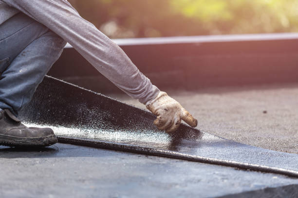 Professional Basement Waterproofing technician working in Spivey, KS